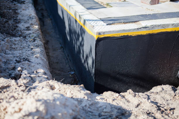 Professional Waterproofing technician working in Fremont, IN